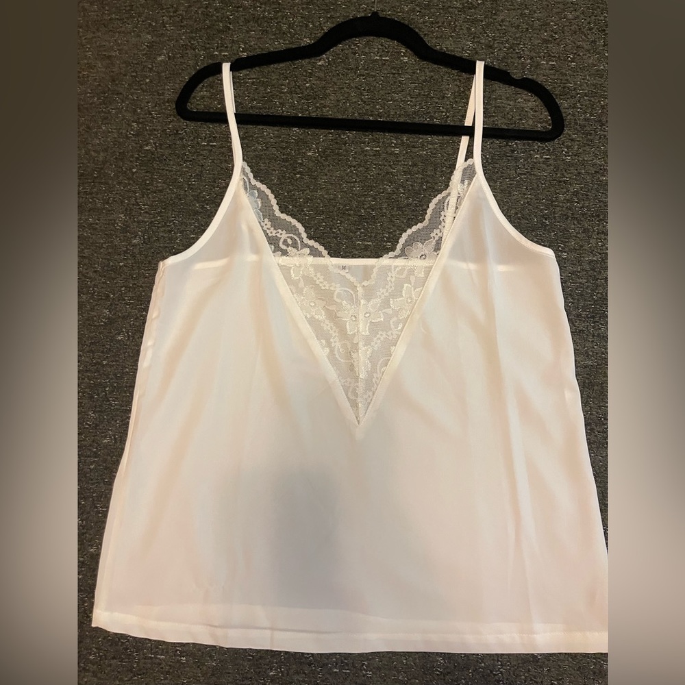 White camisole with lace in the front size medium